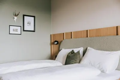 Ein Bett oder Betten in einem Zimmer der Unterkunft Hotel Marvia