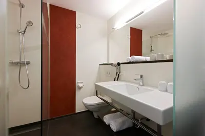 Ein Badezimmer in der Unterkunft Hotel Garni Tannleger B&B