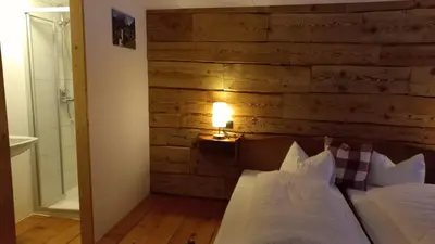 Ein Bett oder Betten in einem Zimmer der Unterkunft Landhaus Bad Hopfreben