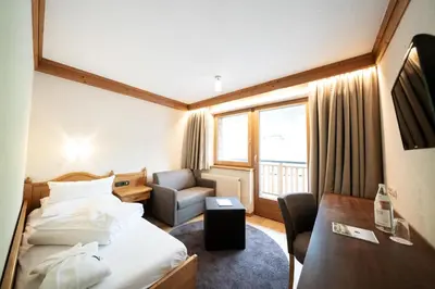 Ein Bett oder Betten in einem Zimmer der Unterkunft Wellnesshotel Warther Hof