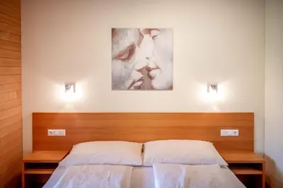 Ein Bett oder Betten in einem Zimmer der Unterkunft Sonnenhof Maurer