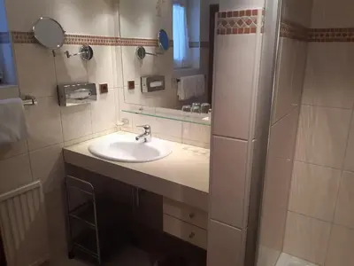Ein Badezimmer in der Unterkunft Hubertusklause