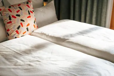 Ein Bett oder Betten in einem Zimmer der Unterkunft Margarethe Apartments Lech