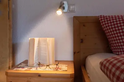 Ein Bett oder Betten in einem Zimmer der Unterkunft Gästehaus Graf