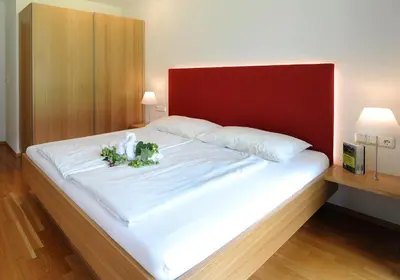 Ein Bett oder Betten in einem Zimmer der Unterkunft Apartments Susanne