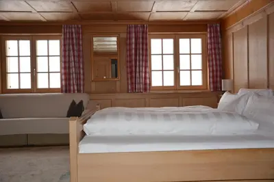 Ein Bett oder Betten in einem Zimmer der Unterkunft Hotel Tannahof