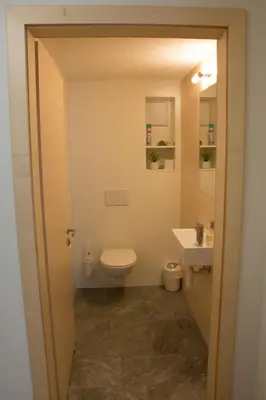 Ein Badezimmer in der Unterkunft Ferienwohnung Schrofamühli