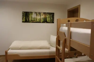 Ein Bett oder Betten in einem Zimmer der Unterkunft Ferienwohnung Därflihof