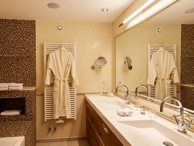 Ein Badezimmer in der Unterkunft Hotel Auriga