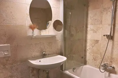 Ein Badezimmer in der Unterkunft Hotel Daneu