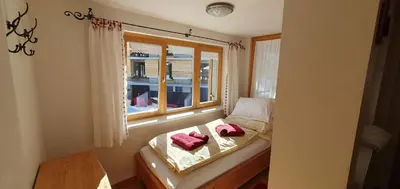 Ein Bett oder Betten in einem Zimmer der Unterkunft Haus Johanneshof 1604