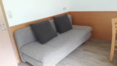 Ein Sitzbereich in der Unterkunft Ferienwohnung Rudigier