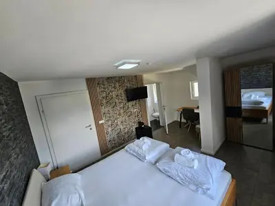 Ein Bett oder Betten in einem Zimmer der Unterkunft Gasthaus Sofram