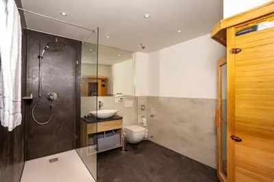 Ein Badezimmer in der Unterkunft Ferienwohnungen & Chalets Capricorno