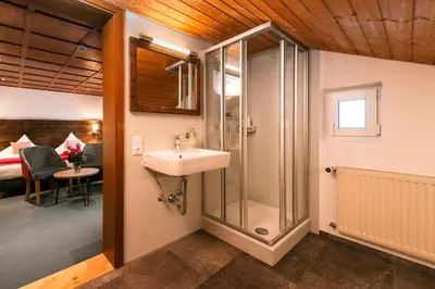 Ein Badezimmer in der Unterkunft Hotel Tradizio