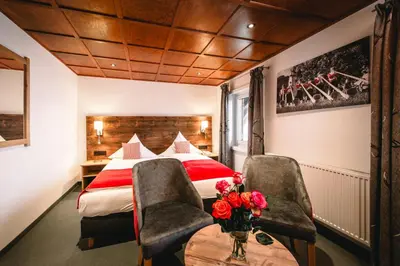 Ein Bett oder Betten in einem Zimmer der Unterkunft Hotel Tradizio