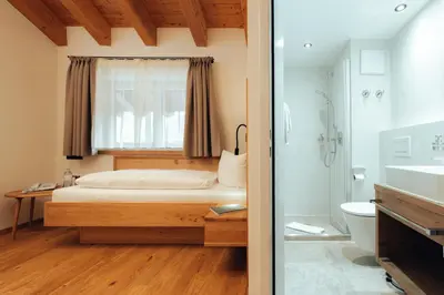 Ein Bett oder Betten in einem Zimmer der Unterkunft Hotel Tradizio