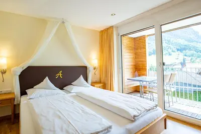 Ein Bett oder Betten in einem Zimmer der Unterkunft Allegra Wohlfühl Appartements