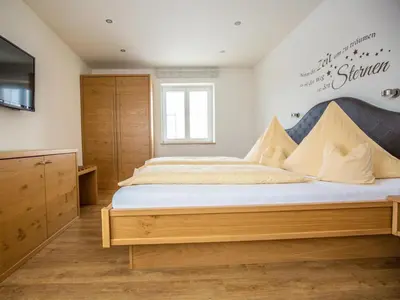 Ein Bett oder Betten in einem Zimmer der Unterkunft Landhaus Harmonie