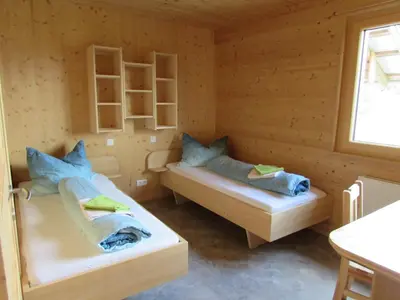 Ein Bett oder Betten in einem Zimmer der Unterkunft Stockreutehof