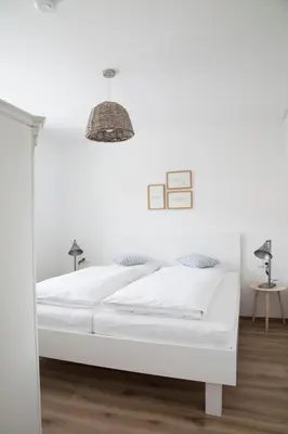 Ein Bett oder Betten in einem Zimmer der Unterkunft ediths Wohnen