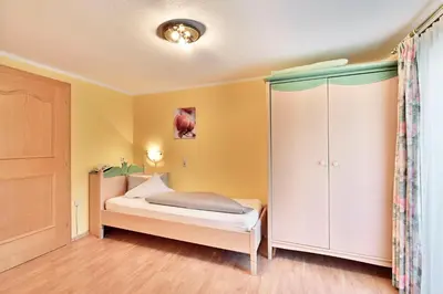 Ein Bett oder Betten in einem Zimmer der Unterkunft Pension Regina