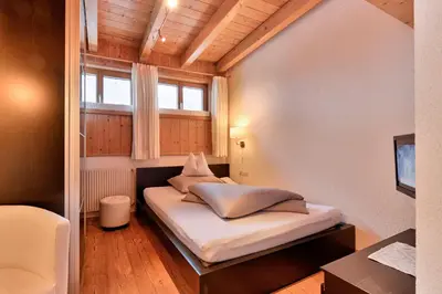 Ein Bett oder Betten in einem Zimmer der Unterkunft Pension Regina