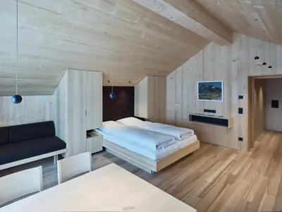 Ein Bett oder Betten in einem Zimmer der Unterkunft Försterhaus Mellau