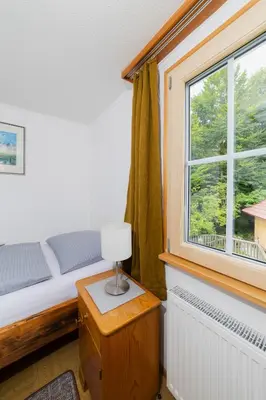 Ein Bett oder Betten in einem Zimmer der Unterkunft Gasthaus Moosegg