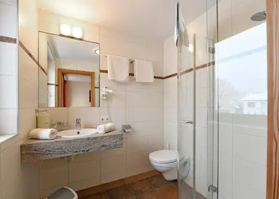 Ein Badezimmer in der Unterkunft Tre Soli Appartements Restaurant