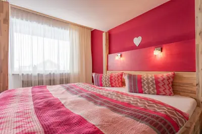 Ein Bett oder Betten in einem Zimmer der Unterkunft Apart Solaria - Wohnungen in Au-Schoppernau