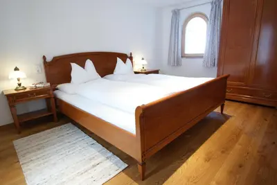 Ein Bett oder Betten in einem Zimmer der Unterkunft Haus Landbrugg