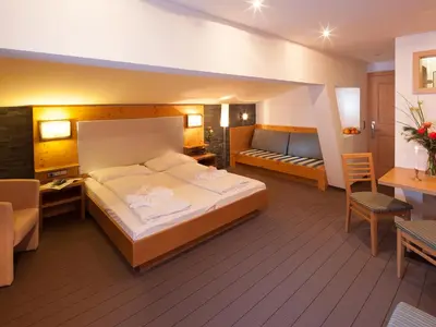 Ein Bett oder Betten in einem Zimmer der Unterkunft Boutique Hotel die Mittagspitze Superior