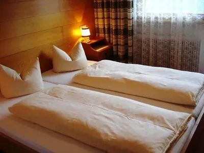 Ein Bett oder Betten in einem Zimmer der Unterkunft Haus Sonnberg