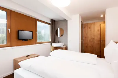 Ein Bett oder Betten in einem Zimmer der Unterkunft Valschena Appartements