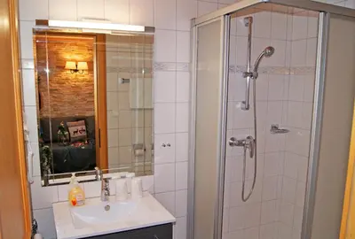 Ein Badezimmer in der Unterkunft Alpina Appartements