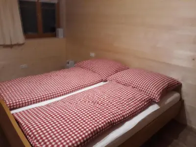 Ein Bett oder Betten in einem Zimmer der Unterkunft Bauernhof Farnach