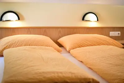 Ein Bett oder Betten in einem Zimmer der Unterkunft Haus Alpenblick