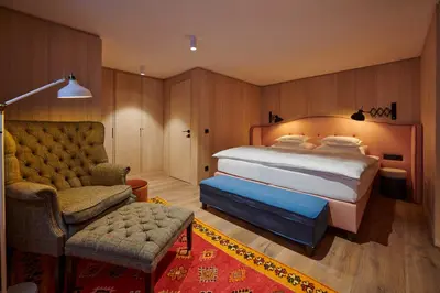 Ein Bett oder Betten in einem Zimmer der Unterkunft Boutique-Hotel Schmelzhof
