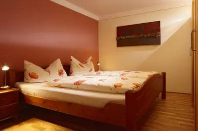 Ein Bett oder Betten in einem Zimmer der Unterkunft Schweizer Hof