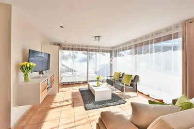 Ein Sitzbereich in der Unterkunft Appartements Haus Dr Muxel