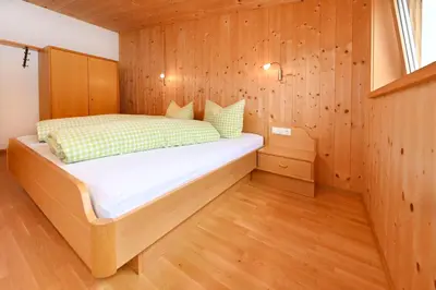 Ein Bett oder Betten in einem Zimmer der Unterkunft Appartements Willi