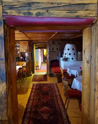 Ein Bett oder Betten in einem Zimmer der Unterkunft Gasthof Auerhahn