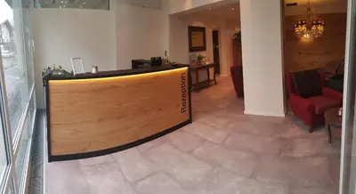 Lobby/Rezeption in der Unterkunft Haller's Posthotel