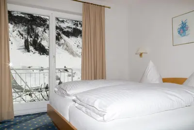 Ein Bett oder Betten in einem Zimmer der Unterkunft Chalet Schneekristall
