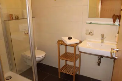 Ein Badezimmer in der Unterkunft Appartements Aurora