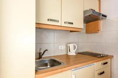 Küche/Küchenzeile in der Unterkunft Aparthotel Kleinwalsertal