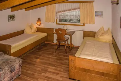 Ein Bett oder Betten in einem Zimmer der Unterkunft Haus Saroja