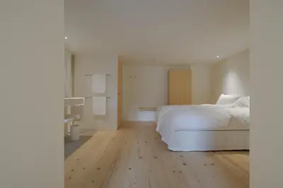 Ein Bett oder Betten in einem Zimmer der Unterkunft BAR10ZIMMER