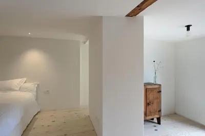 Ein Bett oder Betten in einem Zimmer der Unterkunft BAR10ZIMMER